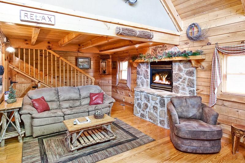 Living room with gas fireplace and flat screen TV